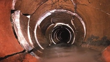 Image of sewage pipe that would typically require sewer repairs